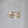 Delicate solitaire diamond engagement ring, set with four double prongs, made in 14k or 18k yellow gold