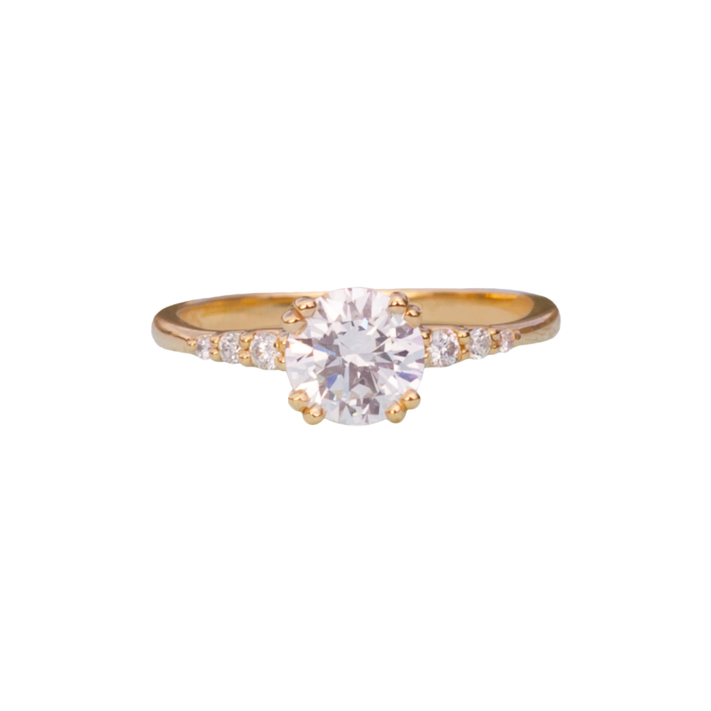 Delicate solitaire diamond engagement ring, set with four double prongs, made in 14k or 18k yellow gold