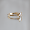 Delicate solitaire diamond engagement ring, set with four double prongs, made in 14k or 18k yellow gold