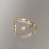 Delicate dangle wedding band, with chevron contour to trace and pair with any engagement ring, whether it’s a solitaire or a halo. This ring is also a perfect everyday stackable ring that can be stacked with your favourite everyday staples, or worn on its own. Made in 14K gold.