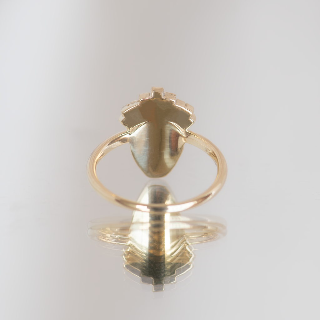 Gold face ring with diamond crown of tapered baguette diamonds, made in solid 14k solid yellow gold.