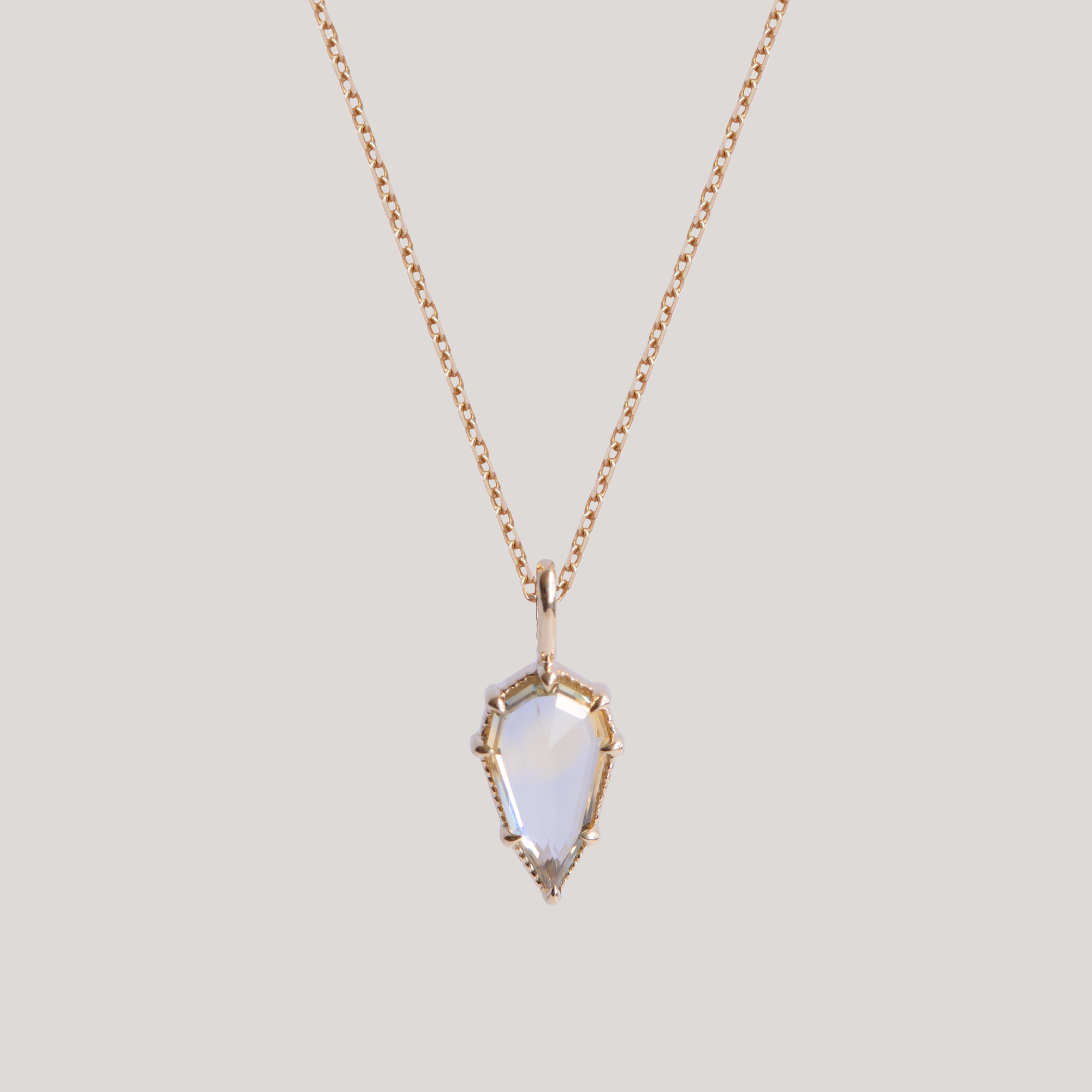 green sapphire 10k gold charm