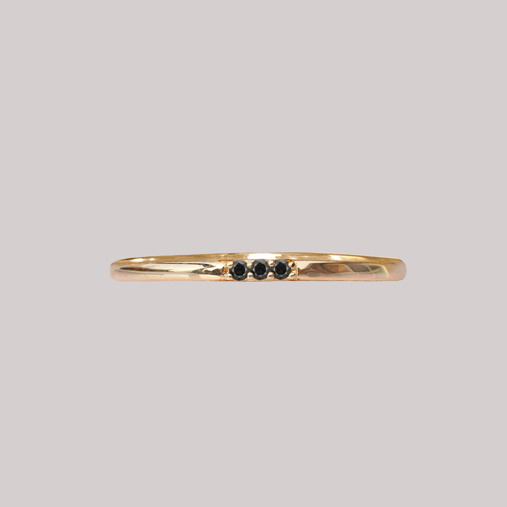 three black diamond ring