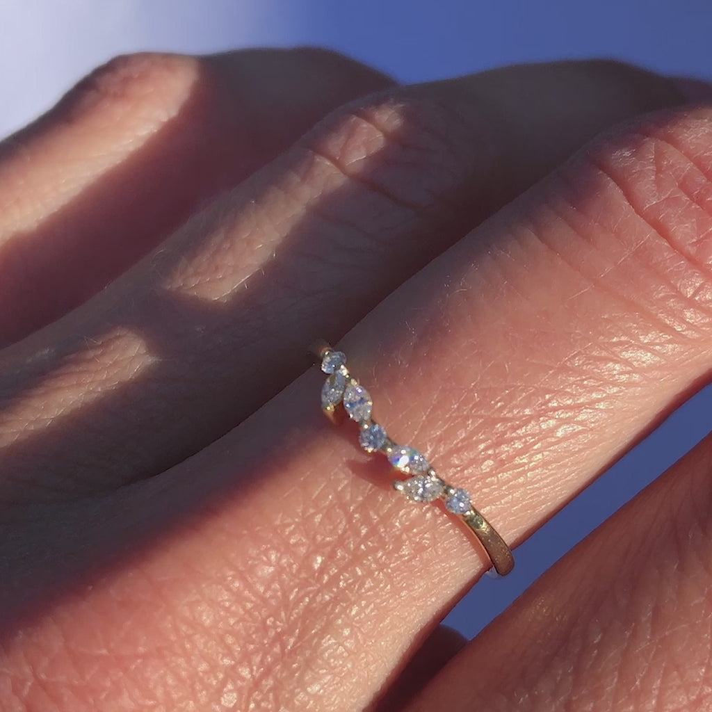 Contour band has a gentle wave design to trace and pair with any engagement ring, whether it’s a solitaire or a halo. 