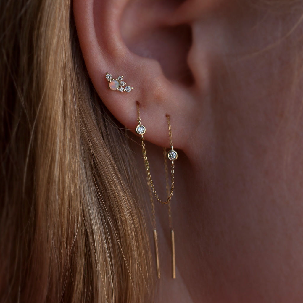 Delicate Ethiopian opal and diamond cluster earring stud, made in 14K yellow gold. Perfect for layering.