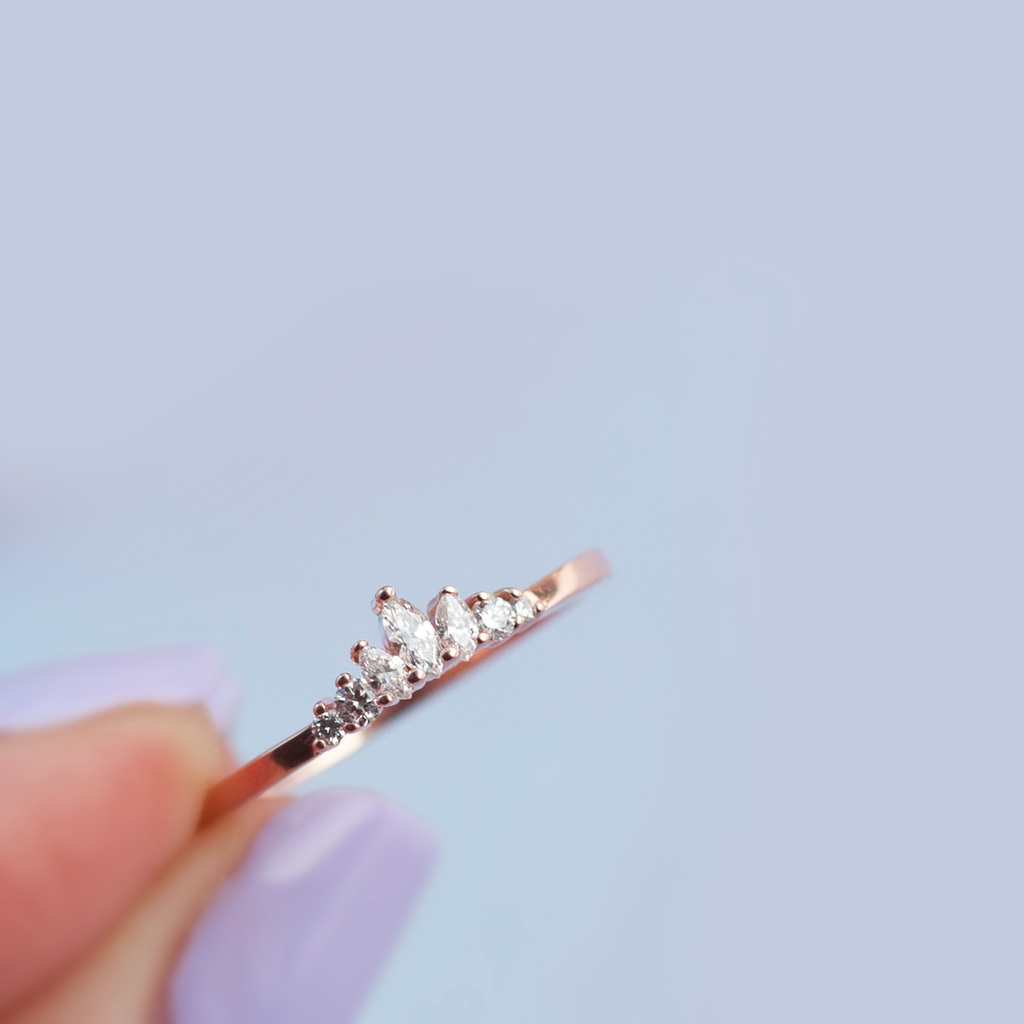 Delicate diamond crown wedding band, with gengle countour, to trace any engagement ring style. Meant to be stacked with an engagement ring or worn on it's own. Made in 14K rose gold.